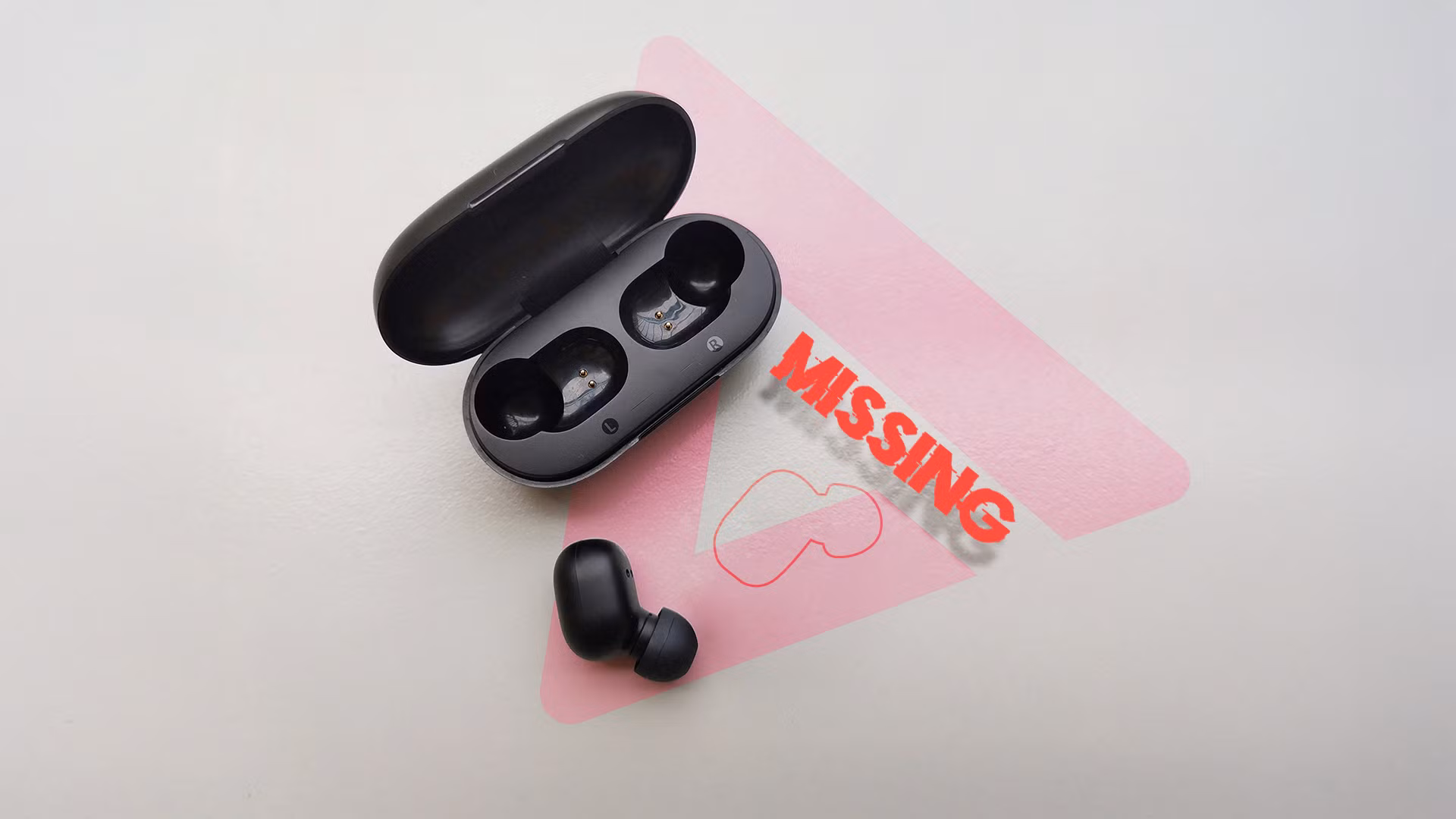 an earbud with a warning next to it saying the other one is missing